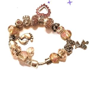 New baby girl mom bracelet. Full of charms and beads